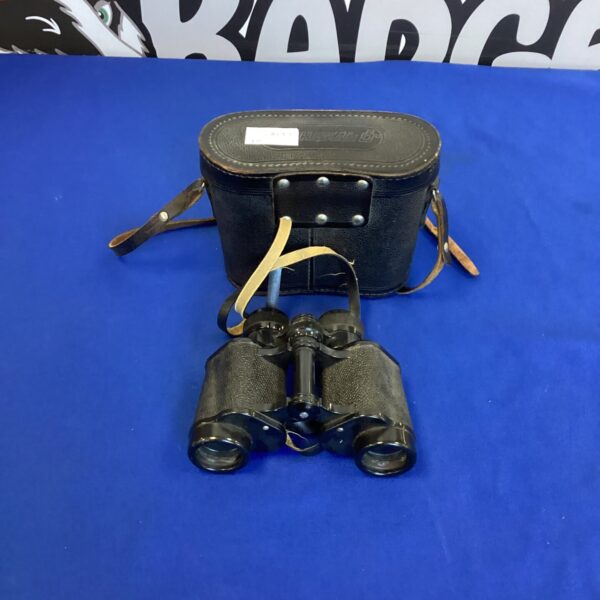 Vintage Russian binoculars with a fitted carrying case.