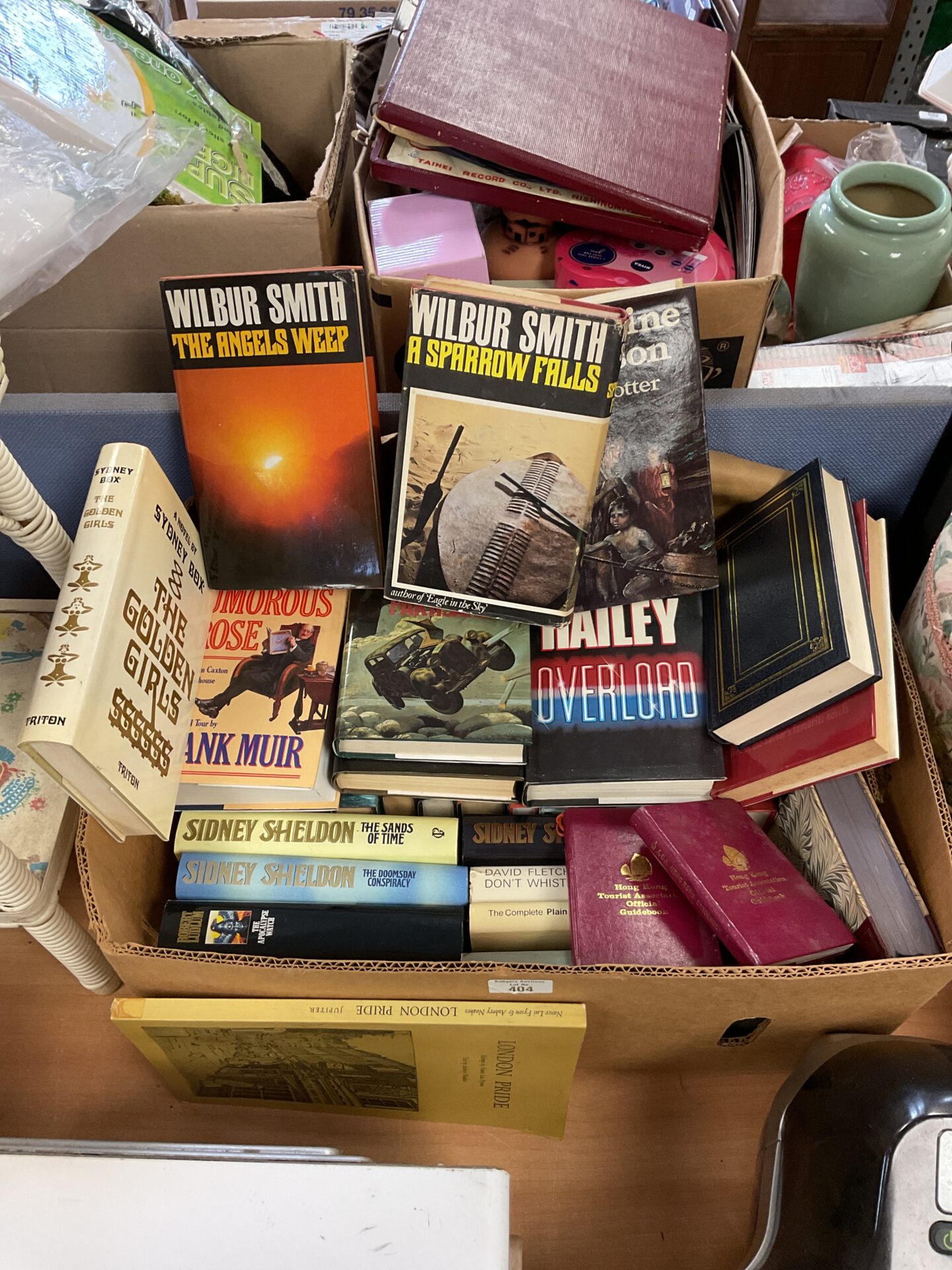447 Box of books to include sidney sheldon & wilbur smith