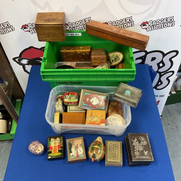 Large collection of vintage trinket boxes and decorative tins.