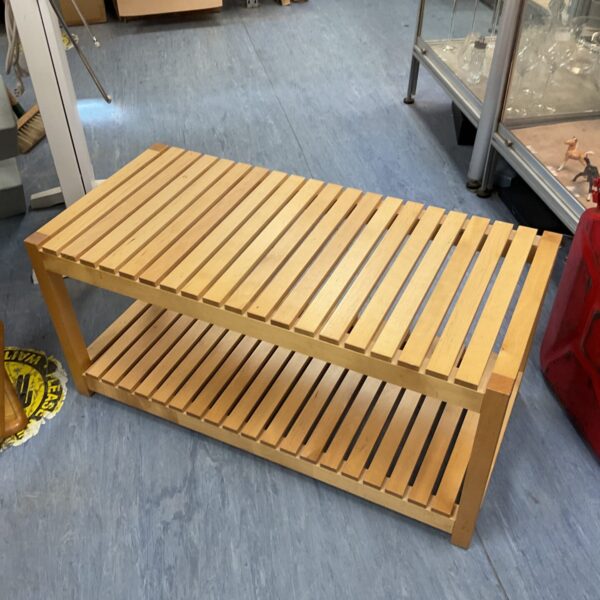Solid teak shoe rack bench for hallway storage.
