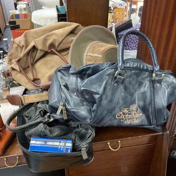 Oxfordshire Golf Club bag with golf gloves and balls.