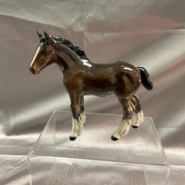 Vintage Beswick shire foal figurine in dark brown gloss.