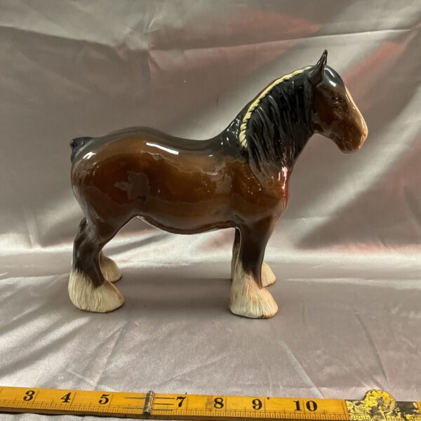 Vintage Beswick Shire horse figurine, detailed ceramic animal collectible.