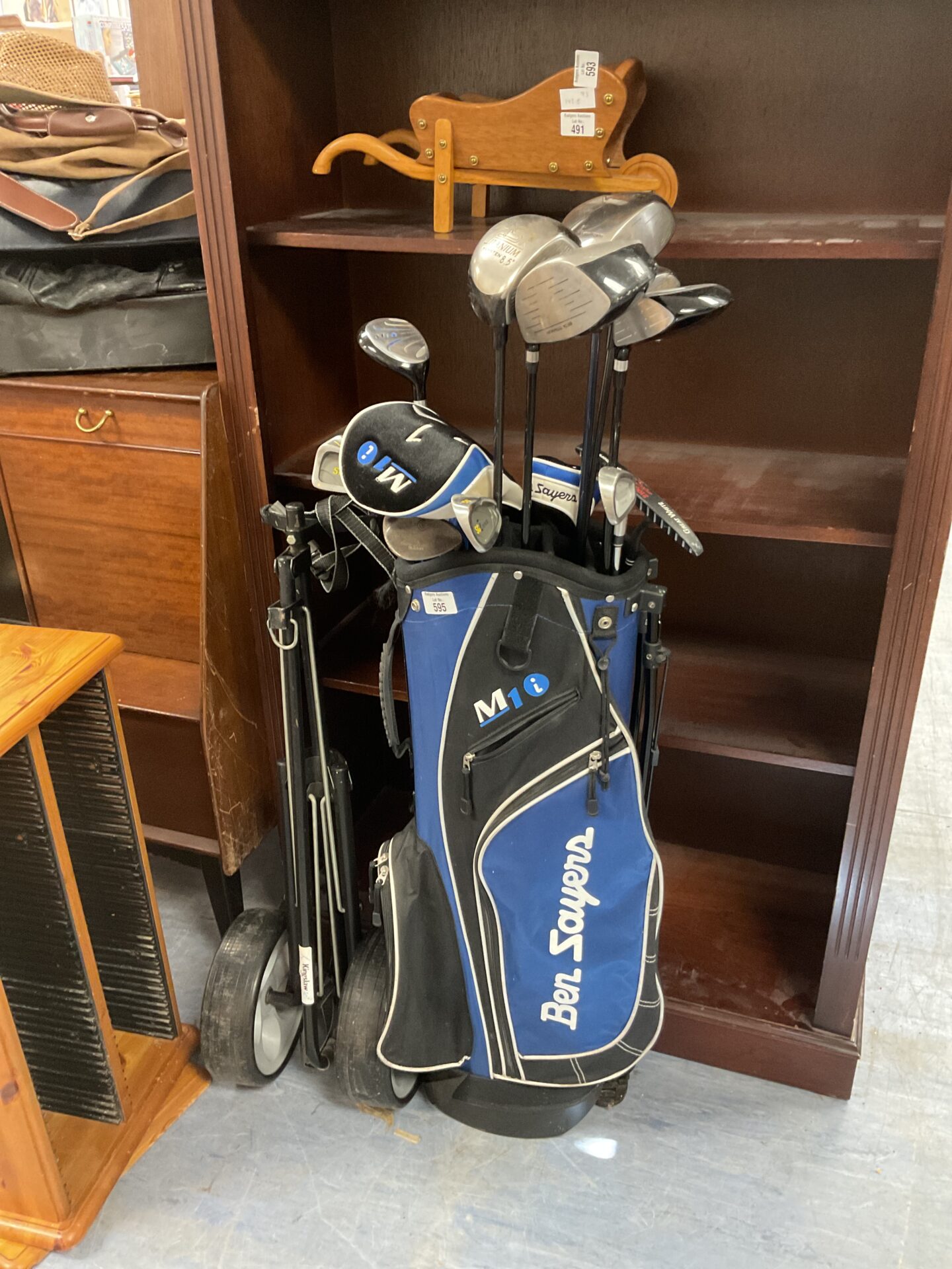 595 Set of ben sayers golf clubs in bag with trolley