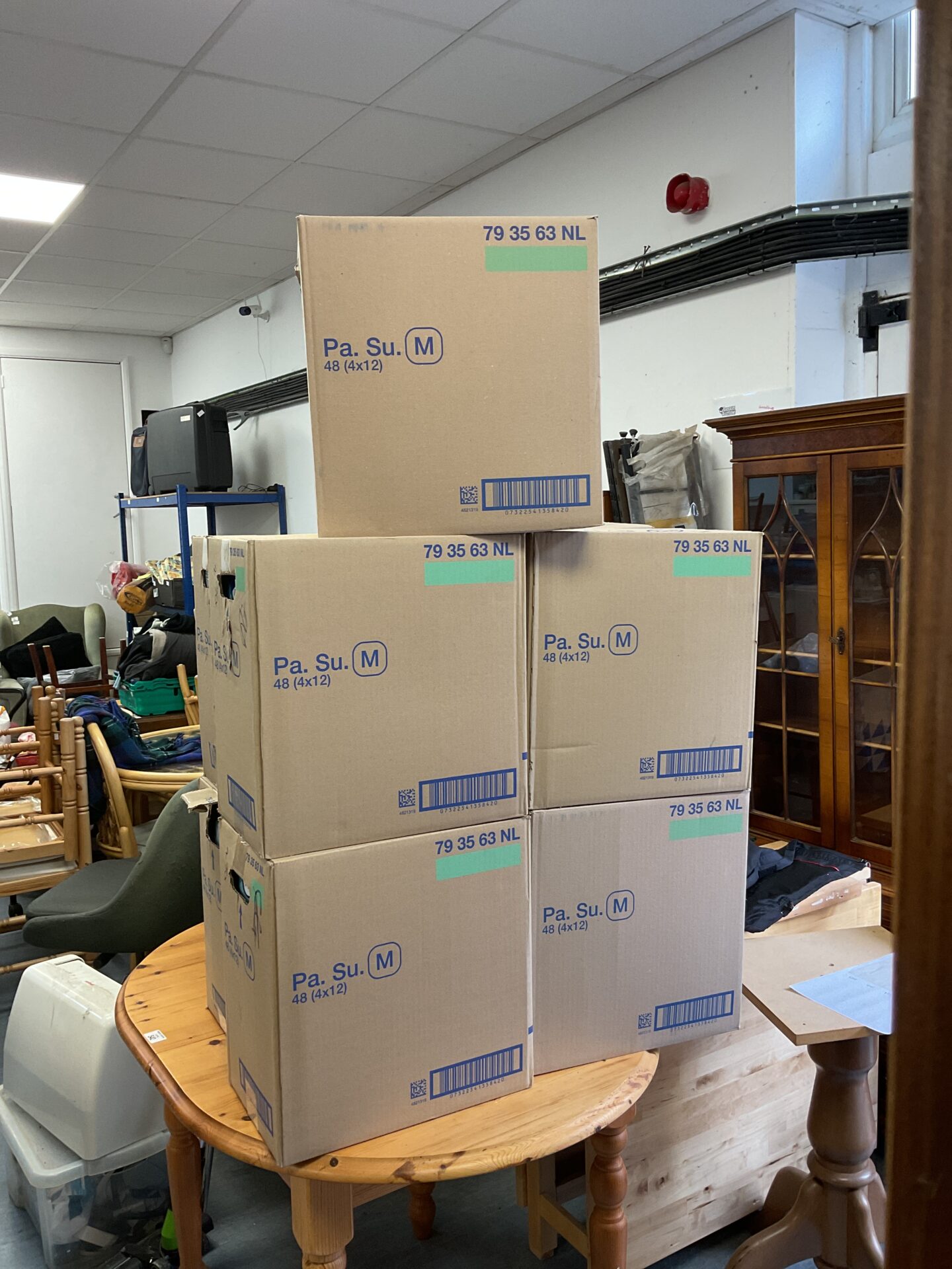 663 Five sealed boxes of 48 tena pants size medium