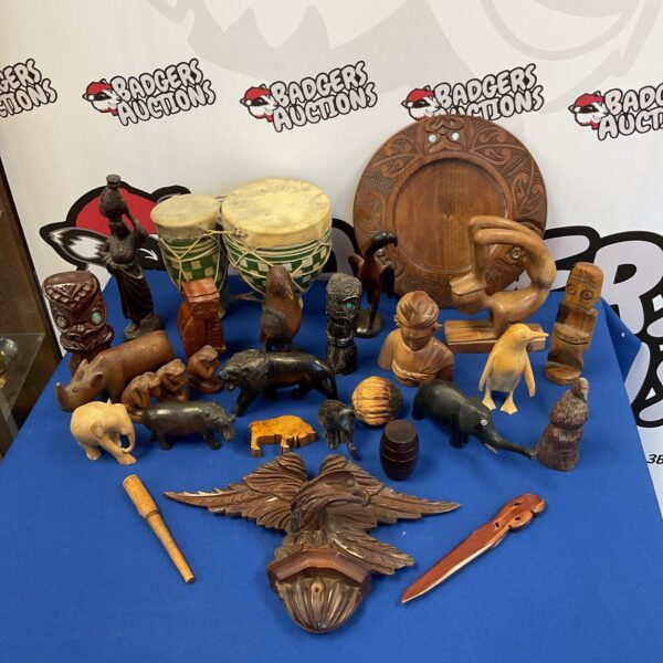 Collection of carved wooden animals and a German eagle for collectors.