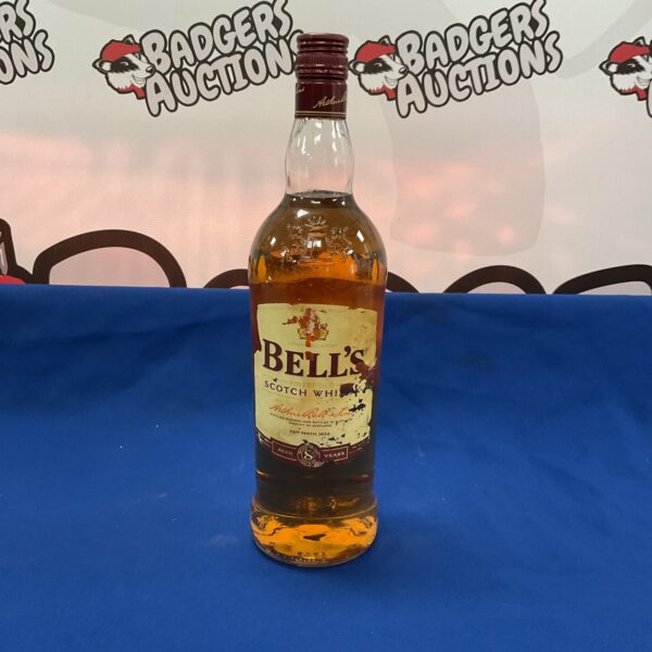 Vintage Bells Scotch Whiskey bottle for collectors and display.