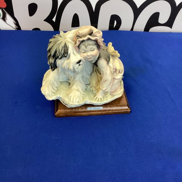 G Armani porcelain figurine of a girl and her sheepdog.