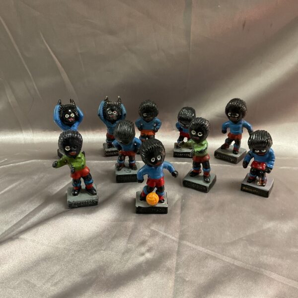 Vintage Robertson golly football players group collectible figures.