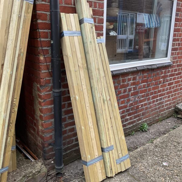 Outdoor timber bundles ready for DIY or garden projects.