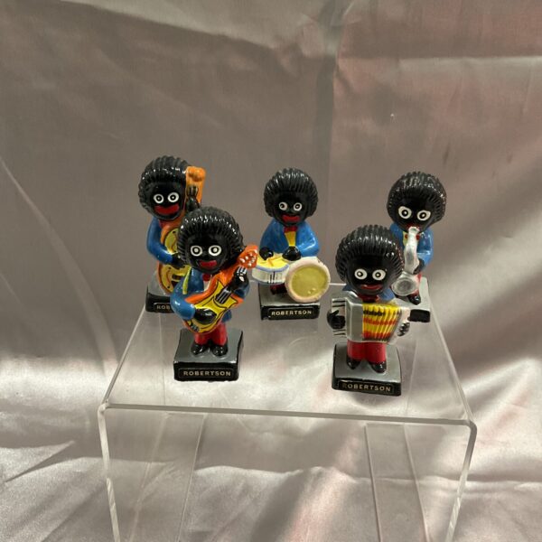 Group of five vintage Robertson golly band figures playing instruments.