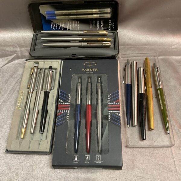 Assorted vintage Parker pens in a collection, ideal for collectors.