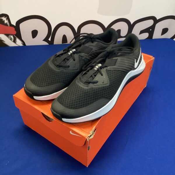 New black and white Nike trainers size 12 for sports and fitness.