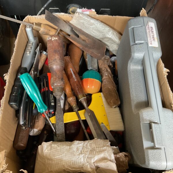 Assorted tool lot with electric screwdriver and hand tools.