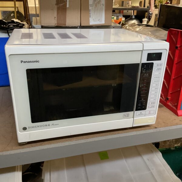 White Panasonic Dimension 4 microwave appliance on a shelf.