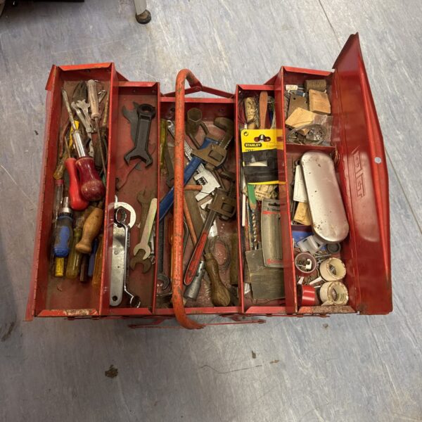 Vintage Talco cantilever toolbox filled with various tools.
