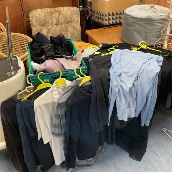 Mixed lot of branded clothing including Cutter & Buck apparel.