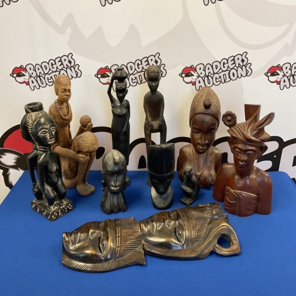 Collection of vintage African carved hardwood figures and busts.