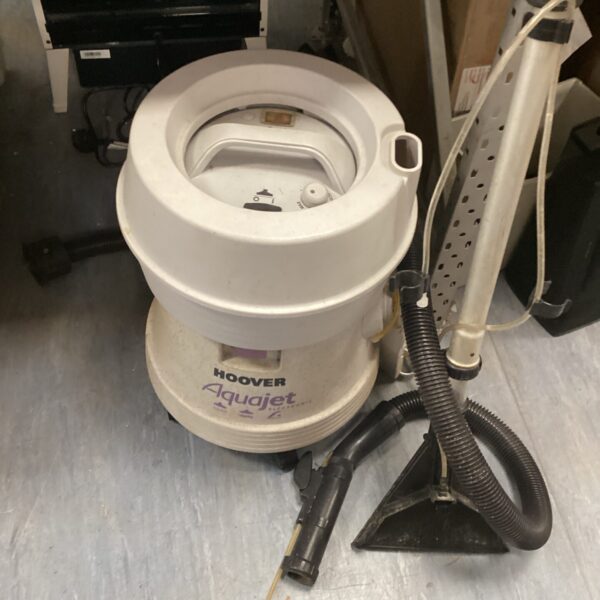 Vintage Hoover Aquajet wet vacuum cleaner with flexible hose.