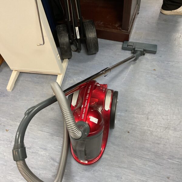 Kenwood 1600w bagless vacuum cleaner in a domestic setting.