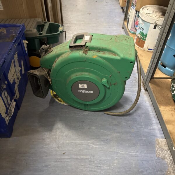 Used Hozelock hose reel for garden watering.
