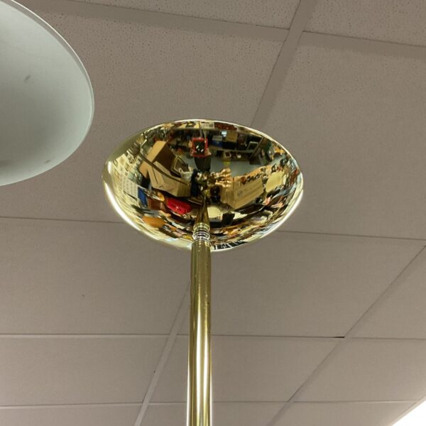 Vintage brass floor lamp uplighter with circular reflector.