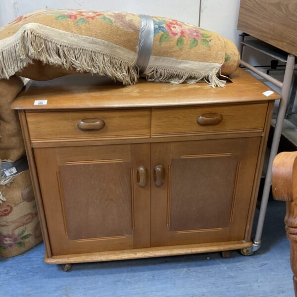 Vintage mid-century teak cabinet with drawers and cupboard.