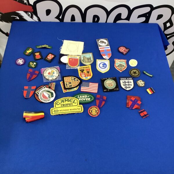 Vintage scout and motoring badges collection for collectors.