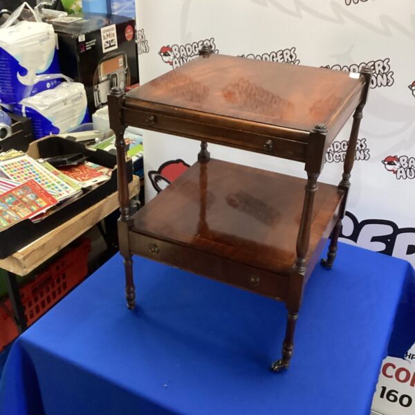 Antique mahogany trolley with two tiers and pullout leaf.