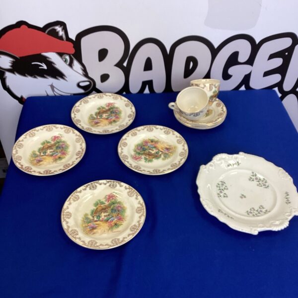 Vintage Staffordshire pottery collection with floral patterns.