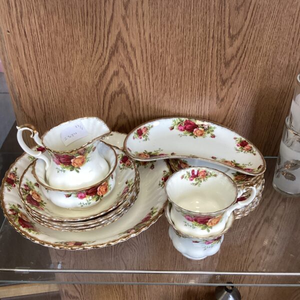 Royal Albert Country Roses tea set with floral design.