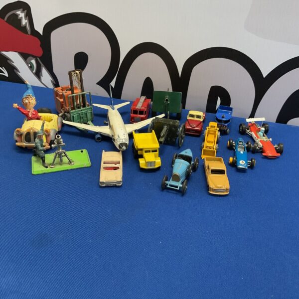 Vintage diecast model collection featuring Corgi and Lesney toy cars.