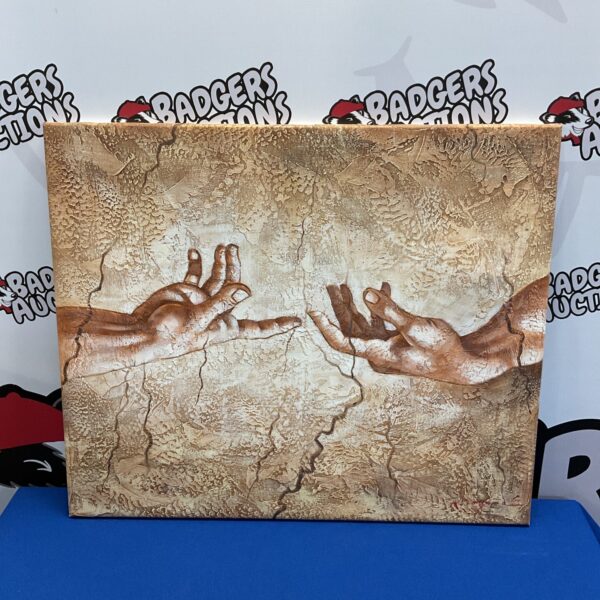 Reproduction oil painting of Michelangelo’s hands from the Sistine Chapel.
