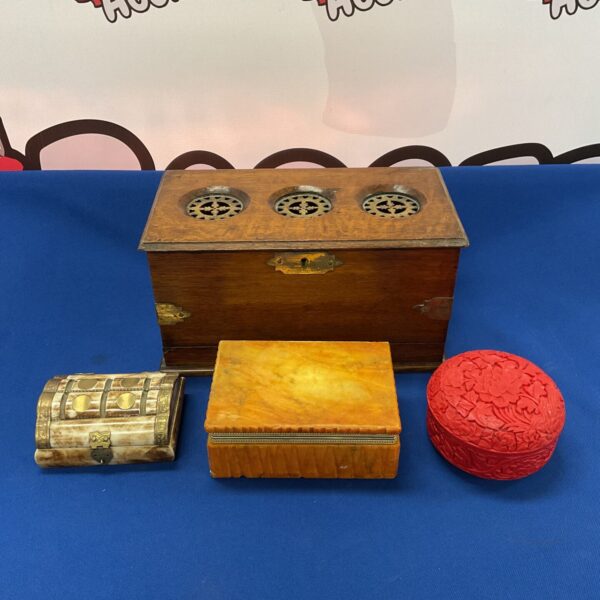 Vintage lot of four trinket boxes, including bone and tobacco caddy.