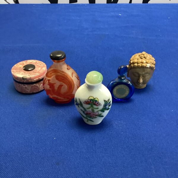 Vintage oriental scent bottles and curios collection.