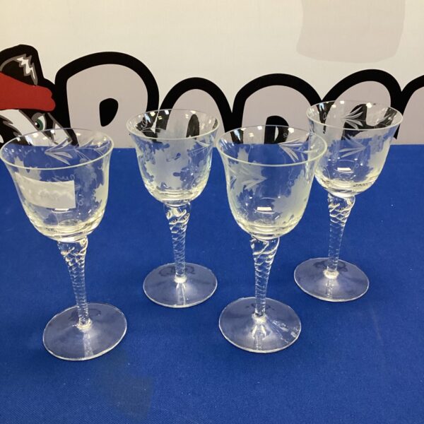 Vintage twist stem wine glasses with etched grape and oak leaf design.