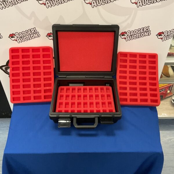 Open Warhammer storage case showing compartmented interior.