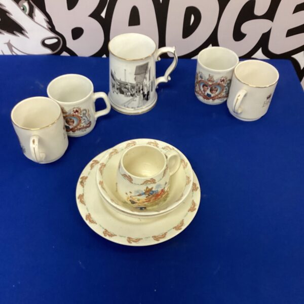 Vintage Royal Doulton Bunnykins china collection on display.