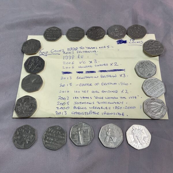 Assorted 50p coin collection including commemorative designs.