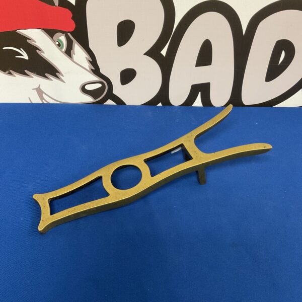 Vintage brass boot jack with horse head design, antique boot puller.