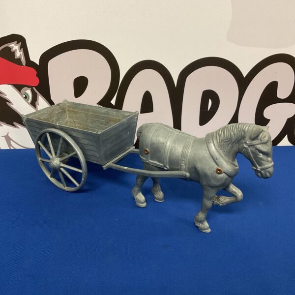 Detailed vintage pewter horse and cart collectible figurine.