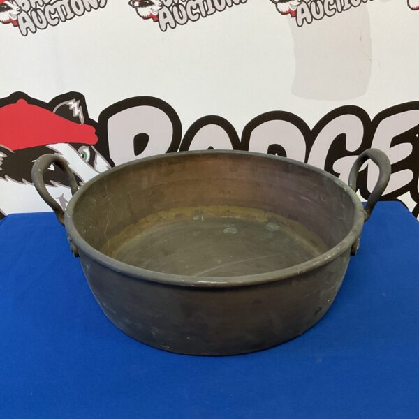 Vintage 16 inch copper pan with aged patina.