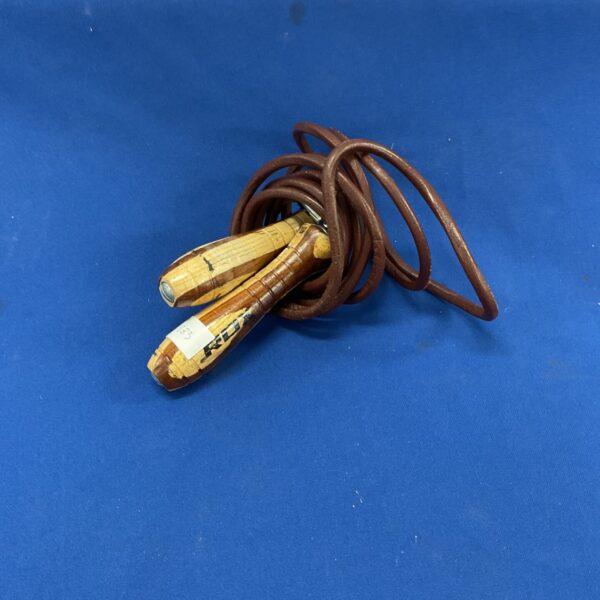 Vintage rdx skipping rope with wooden handles.
