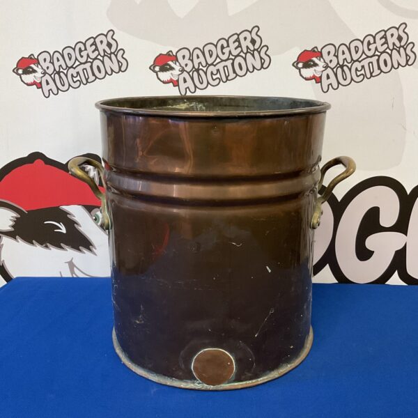 Antique copper boiler pot with handles, vintage farmhouse style.