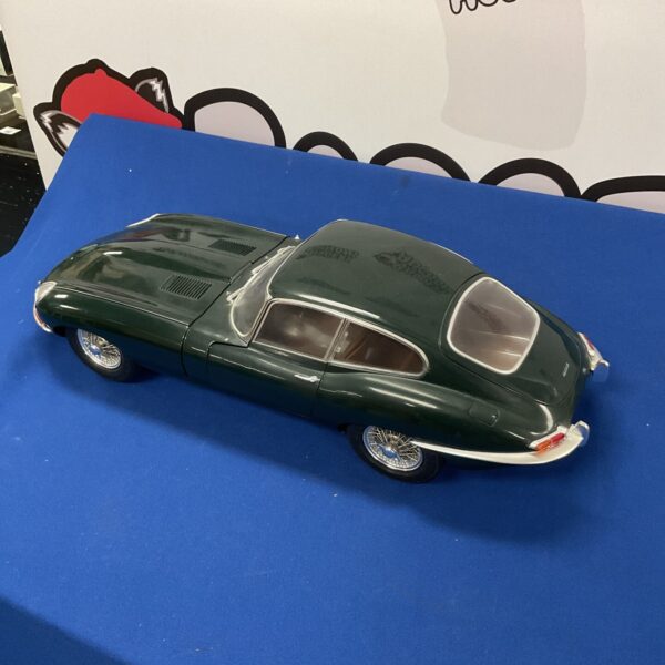 Detailed side view of the Jaguar E Type model car.