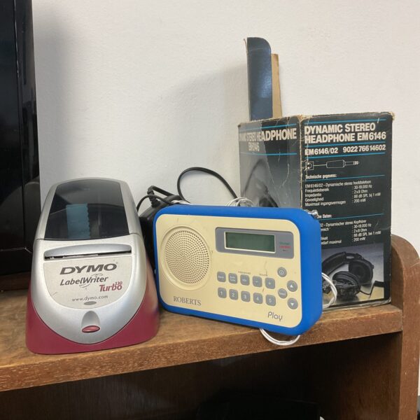 Vintage Dymo label writer with Roberts Play DAB radio and headphones.