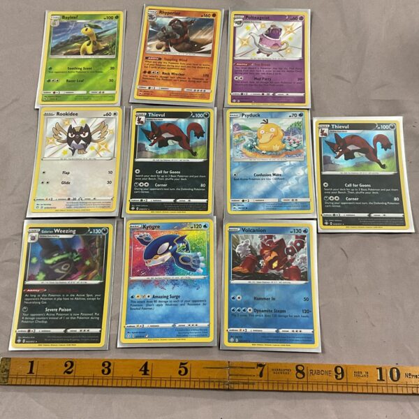 Lot of ten Pokemon holo cards for collectors.