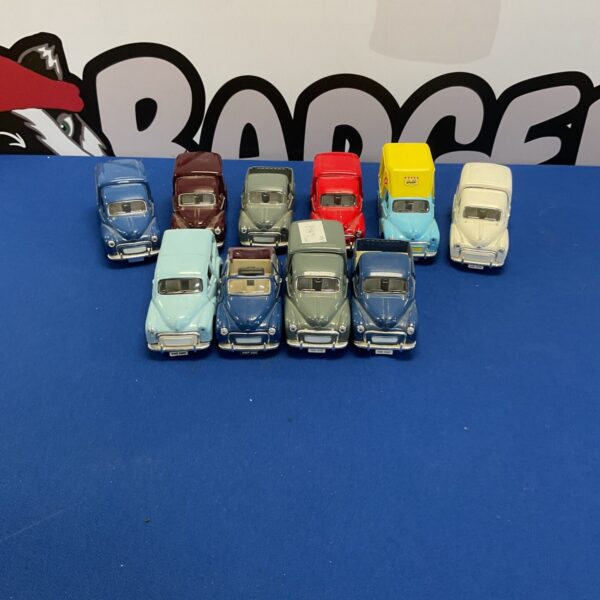 Vintage Morris Minor diecast model cars in a collection.