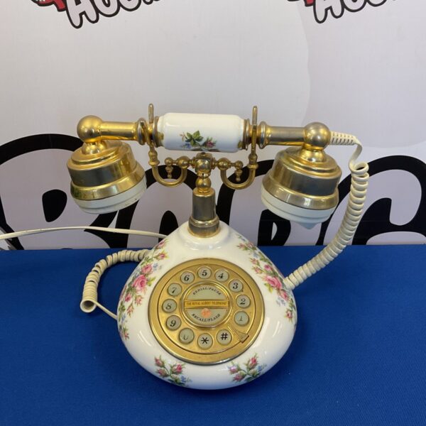 Vintage Royal Albert Moss Rose ceramic telephone with floral design.