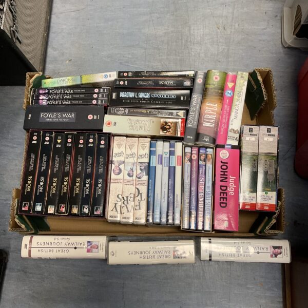 Tray of DVD box sets including Inspector Morse series.